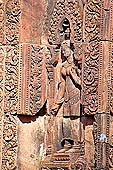Banteay Srei temple - central sanctuary south doorway, sculpted devata in niche
